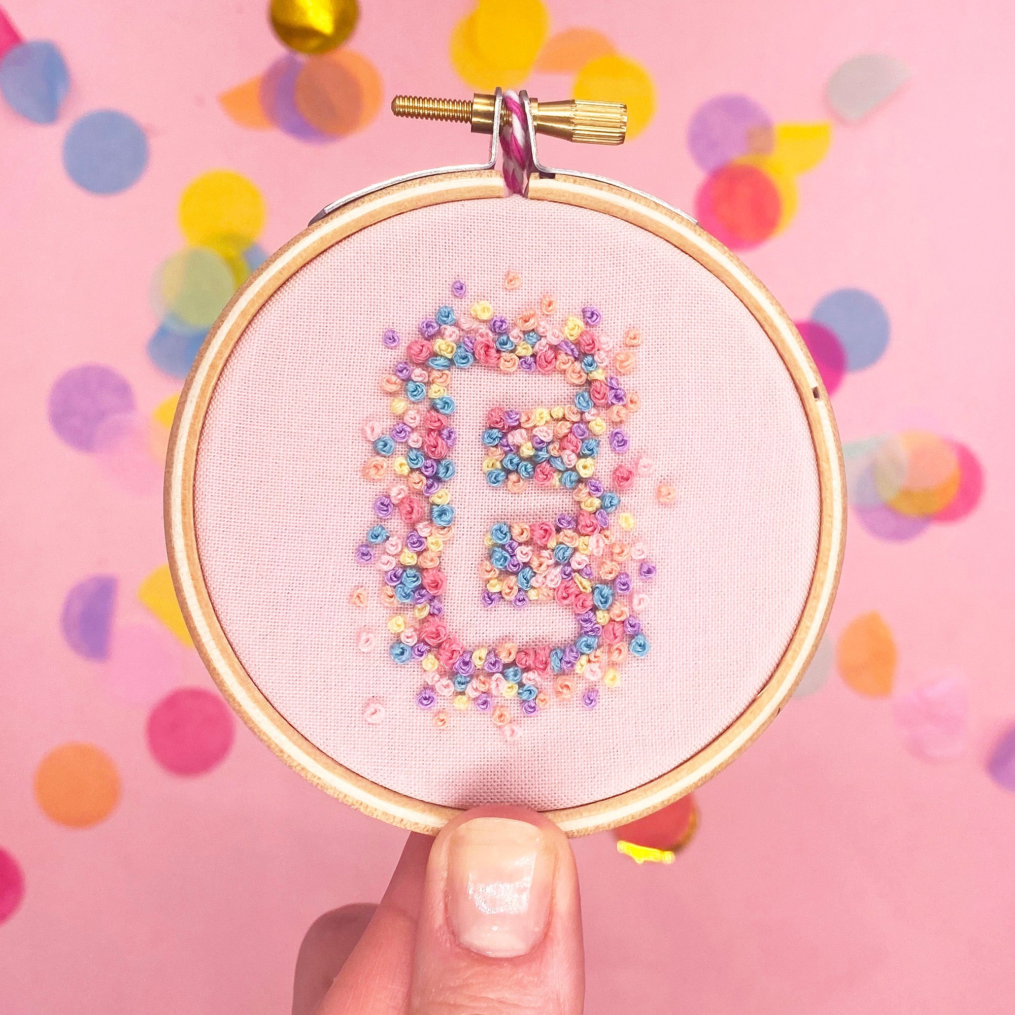 negative space embroidery design stitched with french knots