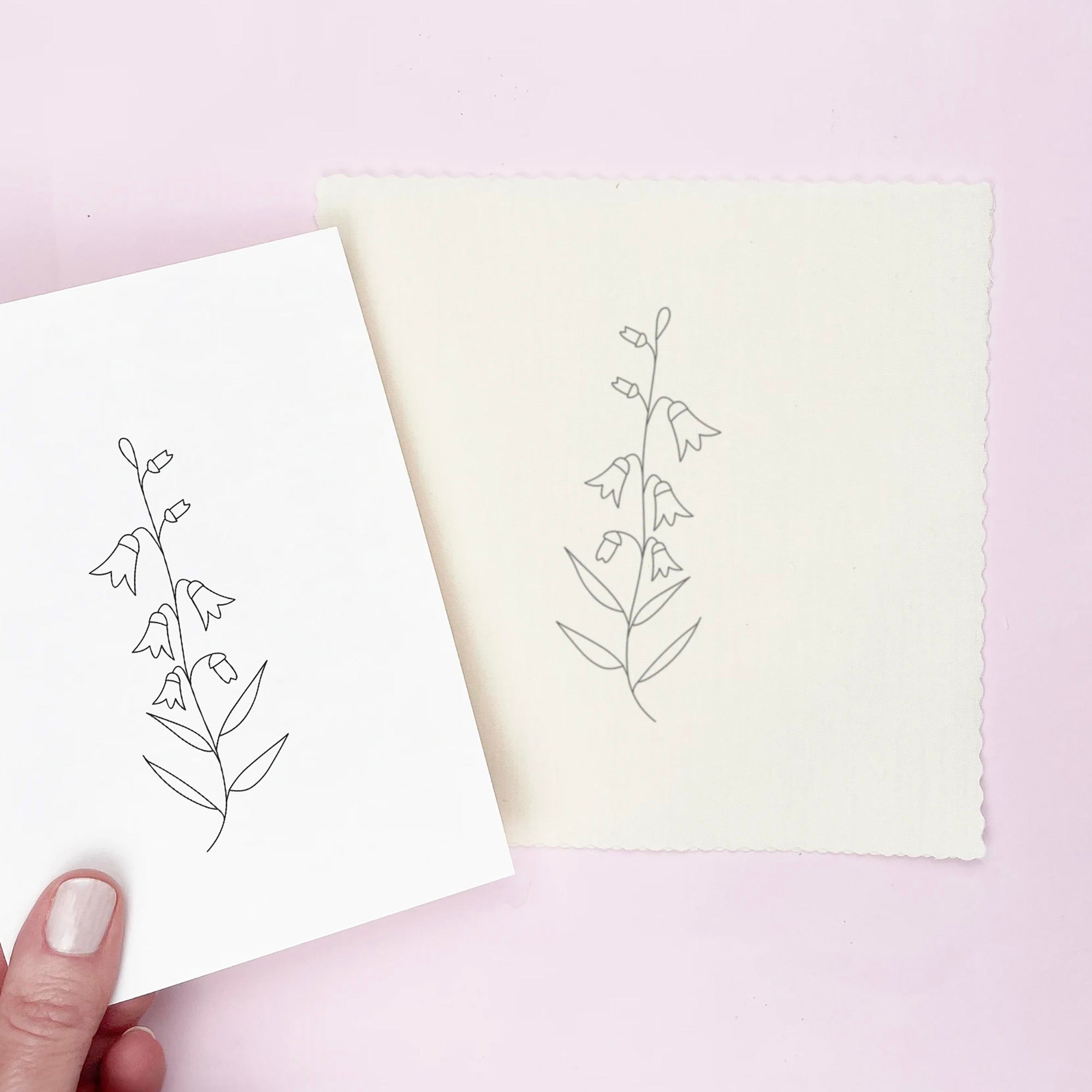 Iron on embroidery transfer sheet with floral design ironed on to fabric