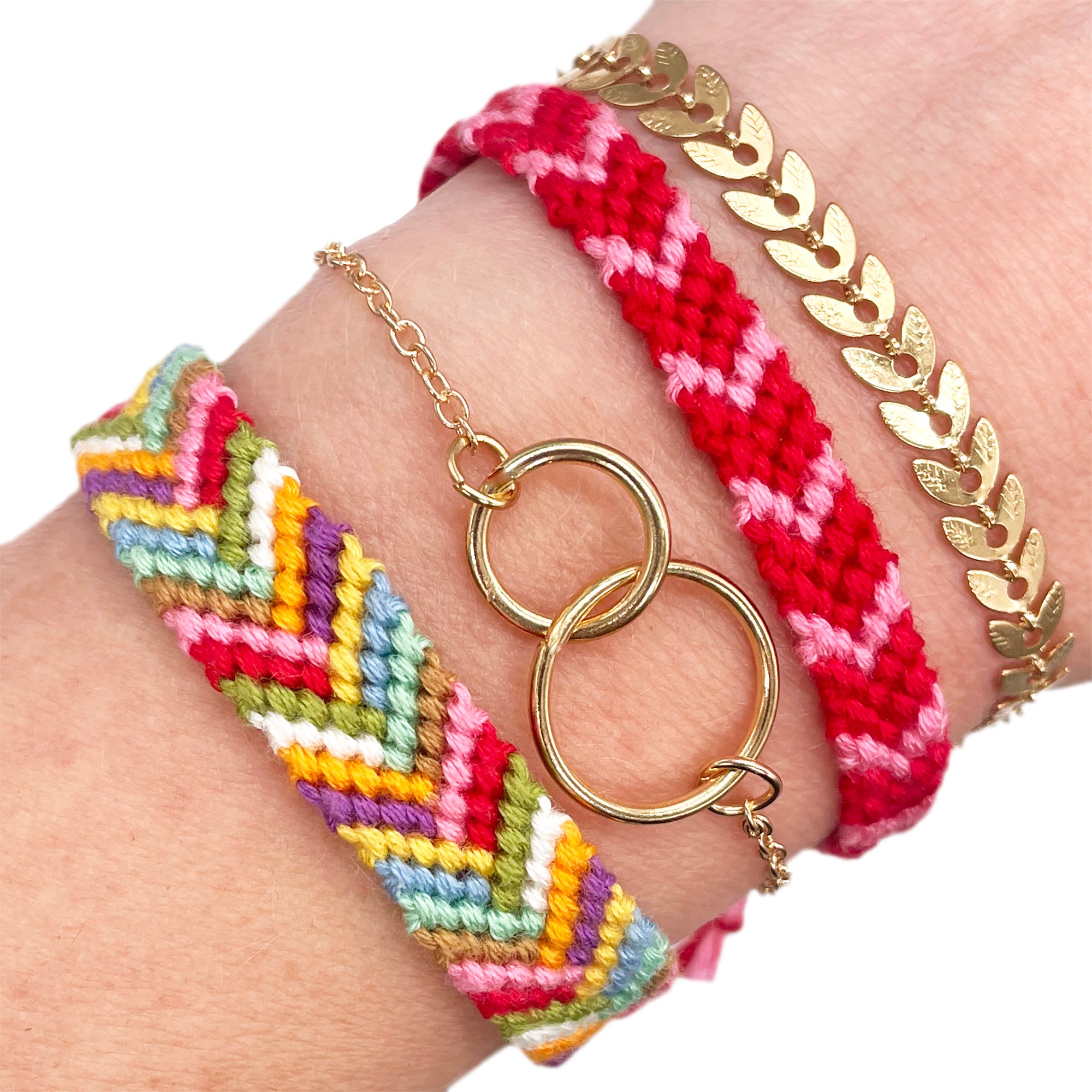 A mix of handmade chevron friendship bracelets with a gold infinity bracelet. A creative and colourful DIY jewellery making kit gift.