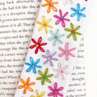 Colorful embroidered flower designs on Hand embroidered bookmark made from a craft kit