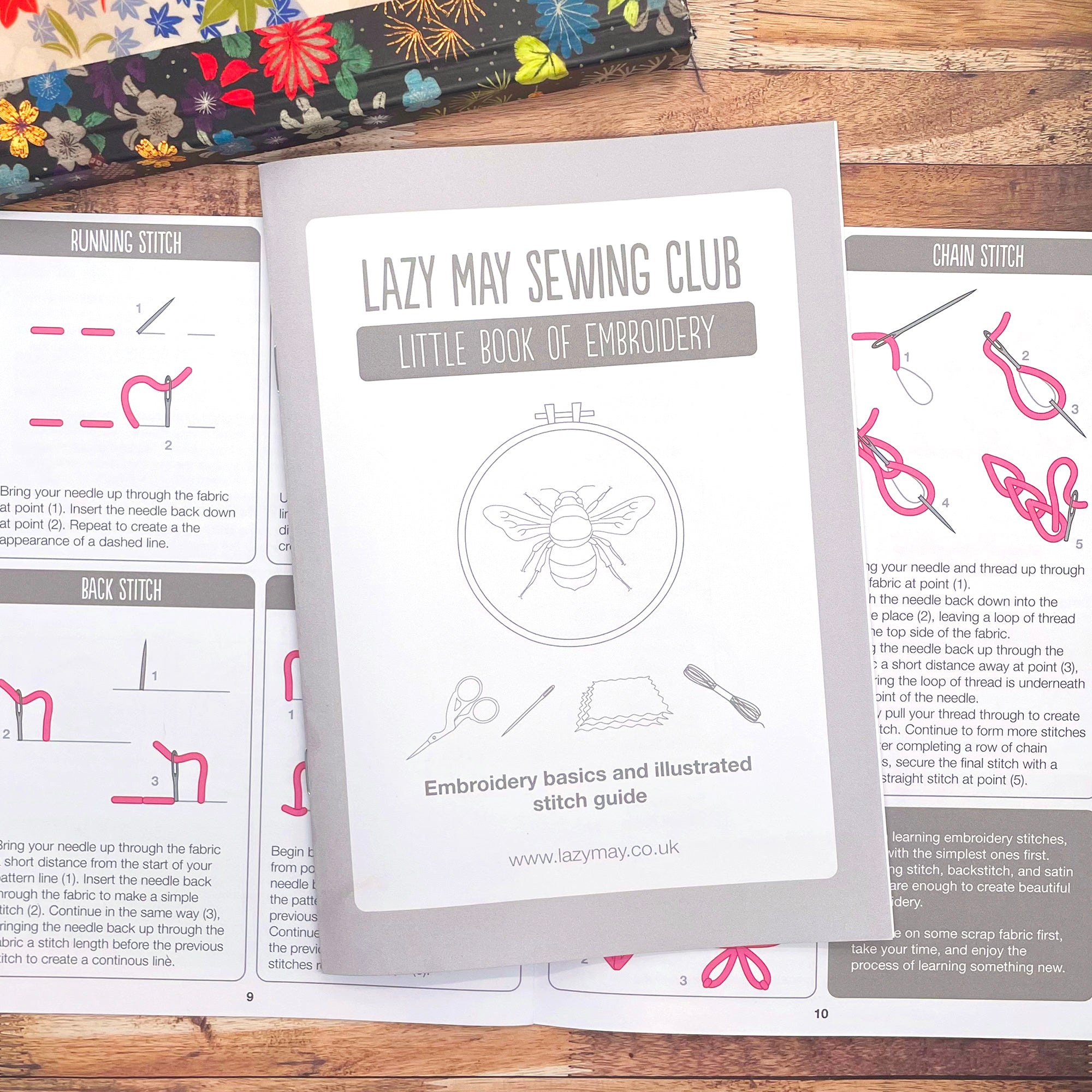 Lazy May Sewing Club’s Little Book of Embroidery, a guide to embroidery stitches, shown with water-soluble stick and stitch embroidery patterns featuring British biscuits.