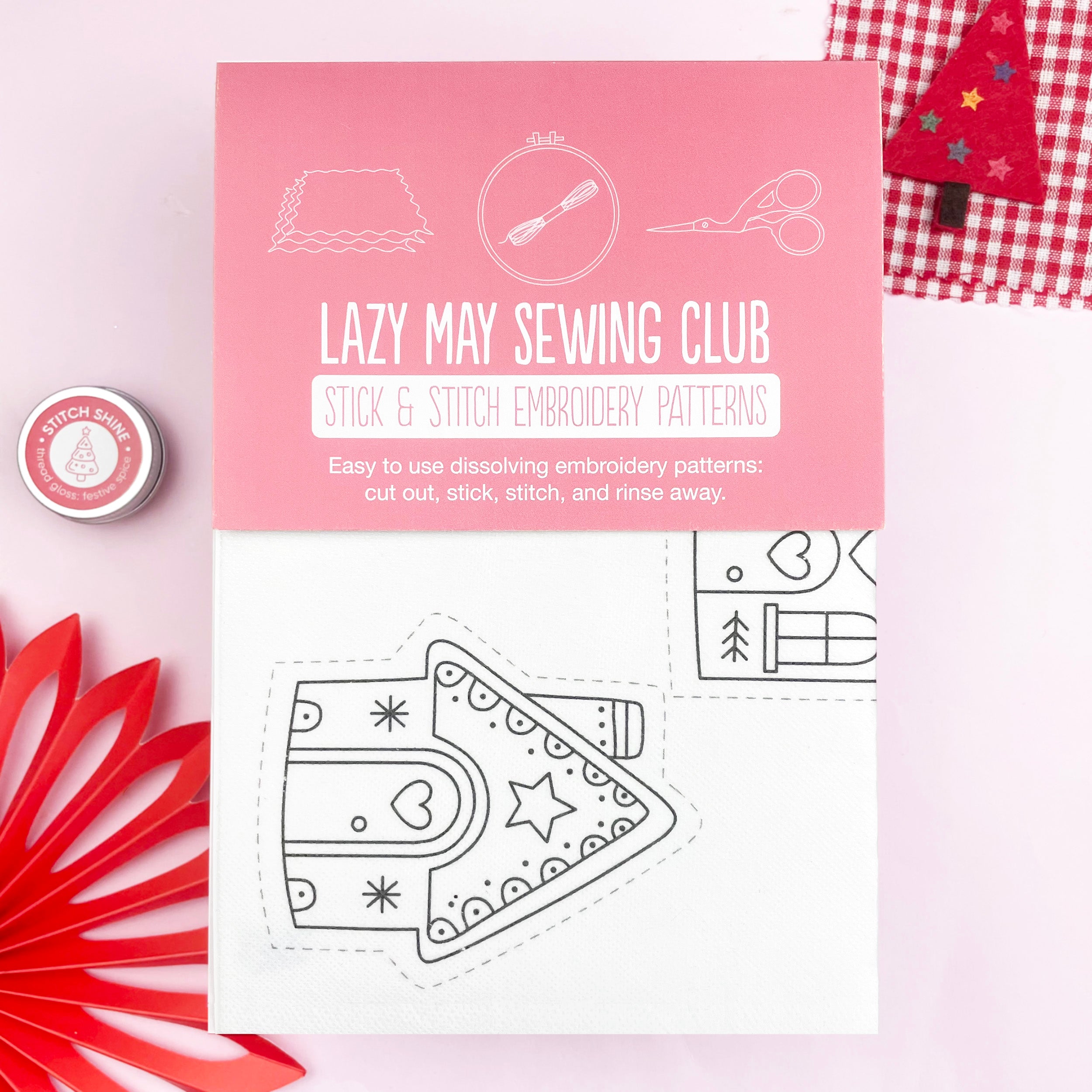 Lazy May Sewing Club stick & stitch embroidery patterns on a pink background