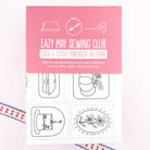 Packaging of Lazy May Sewing Club stick and stitch embroidery patterns on a pink background.