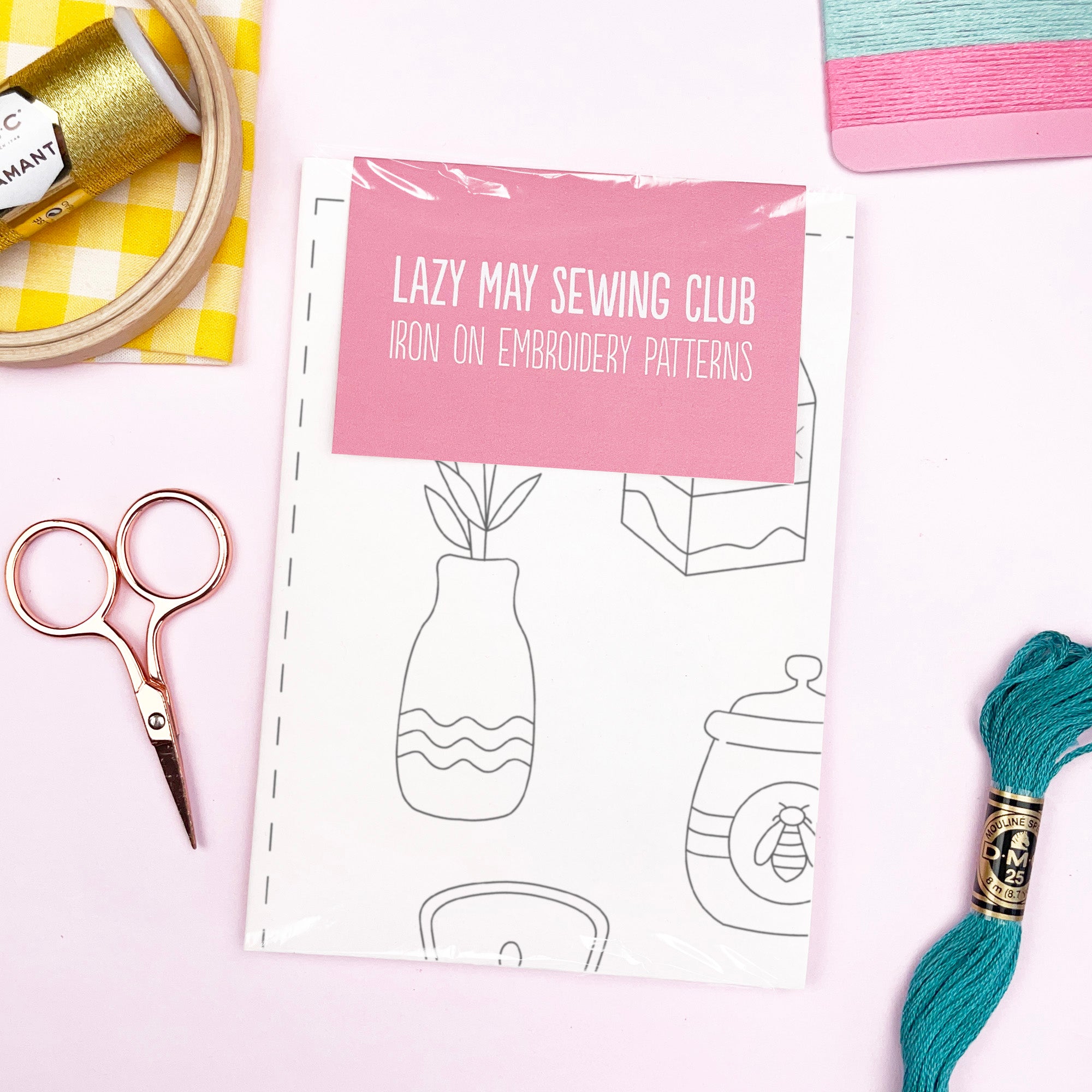 Lazy May Sewing Club iron-on embroidery patterns breakfast kitchen themed with sewing tools on a white background