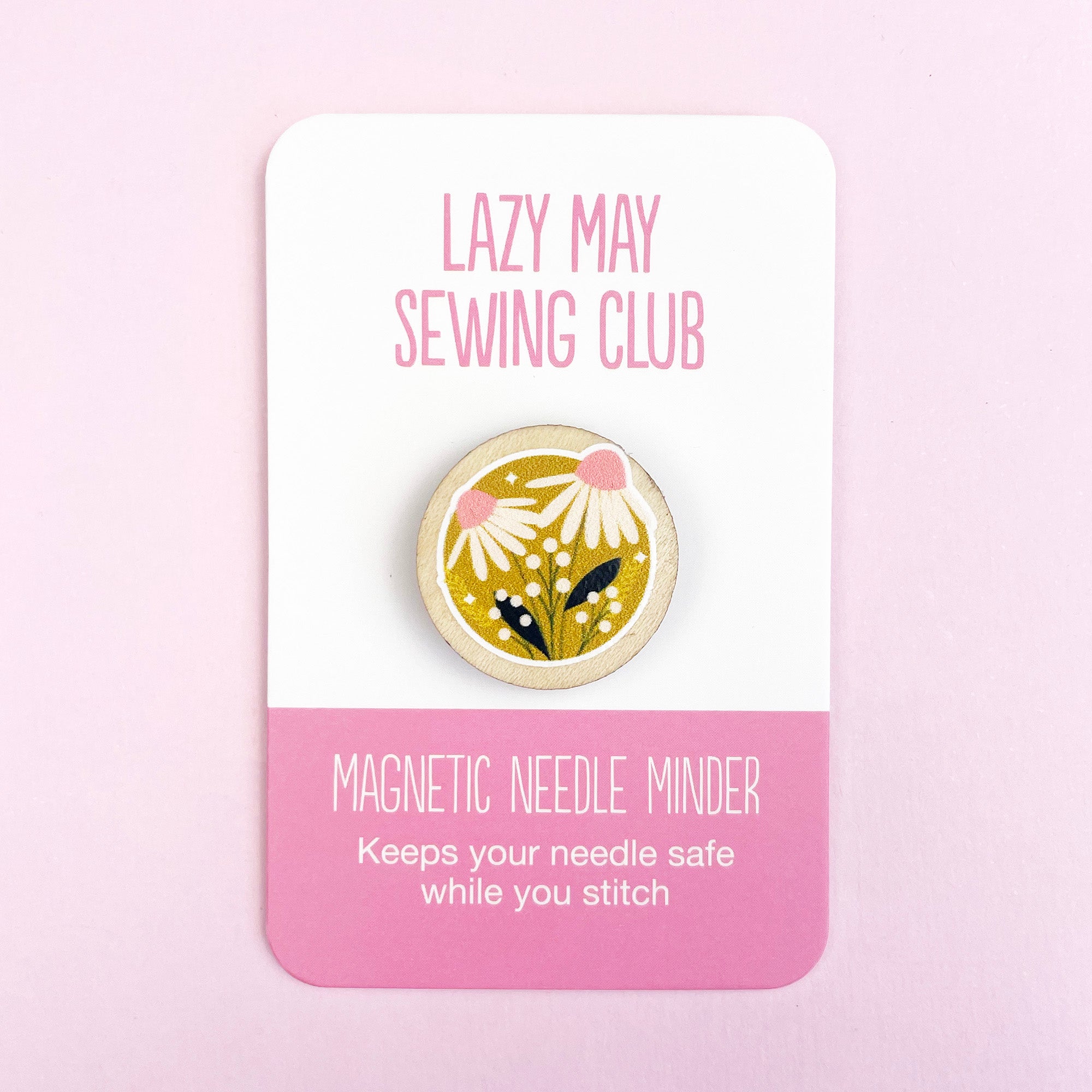 Floral magnetic needle minder on a Lazy May Sewing Club card with a pink background