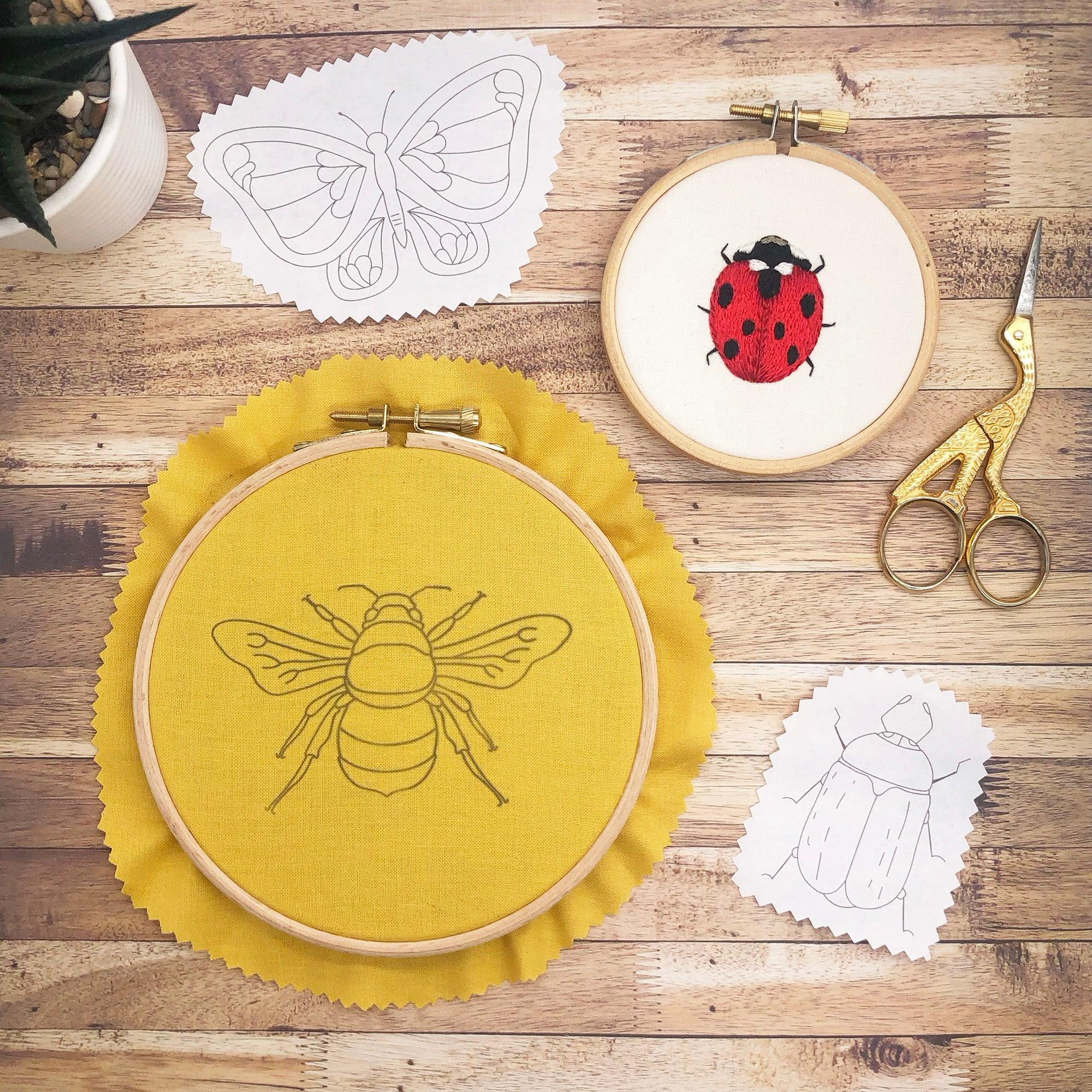 Table showing insect embroidery hoops and insect embroidery patterns hand embroidered ladybird and honey beeBugs and Butterflies: Iron-On Embroidery Transfer Patterns - Lazy May Embroidery