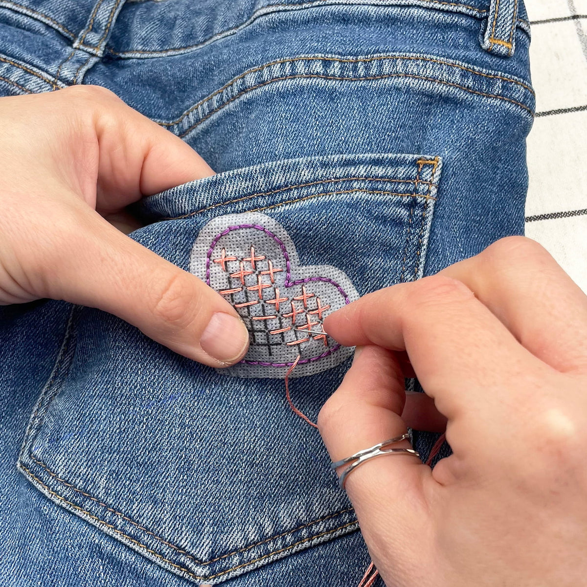 embroidery on jeans with stick and stitch patterns