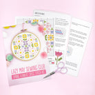 Close up of instructions to make a floral cross stitch hoop