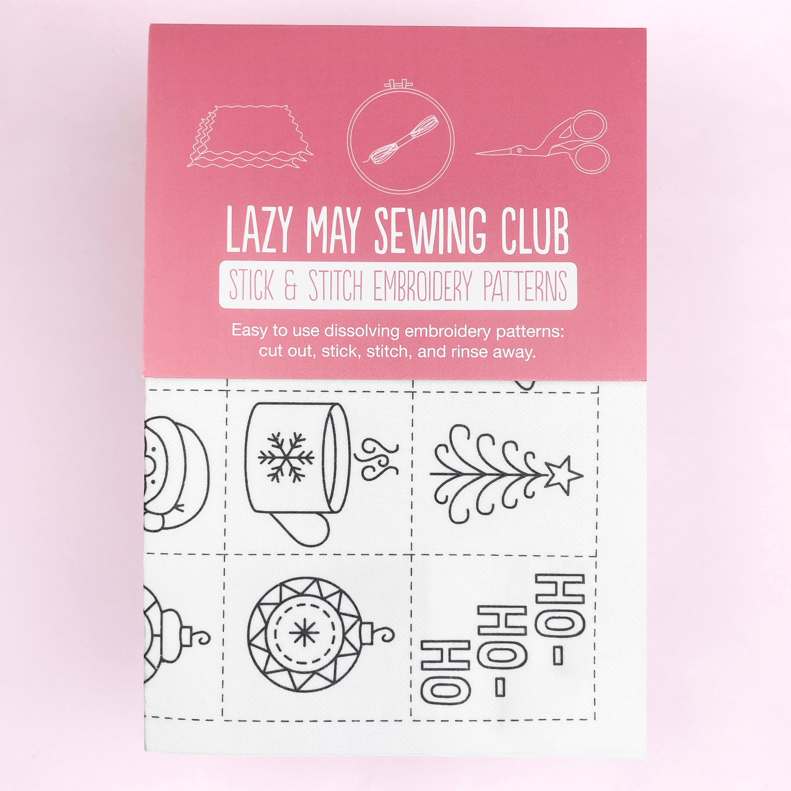 Cover of 'Lazy May Sewing Club' with embroidery patterns on a pink and white background
