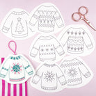 embroidery patterns of Christmas sweaters with patterns on a pink background.