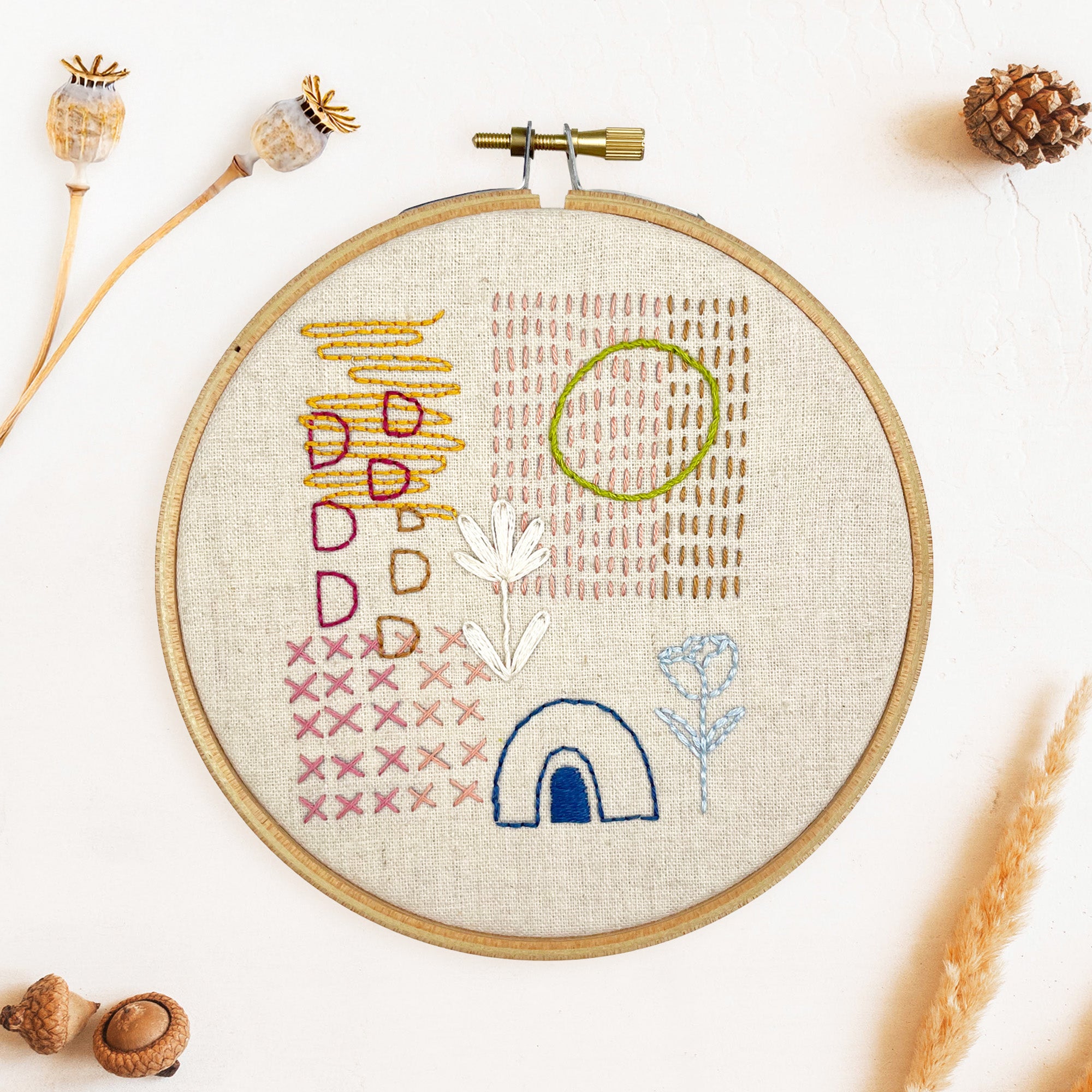 Embroidered hoop with colorful abstract stitches showing organic shapes and textures Iron-On Embroidery Patterns Slow Stitching Textures