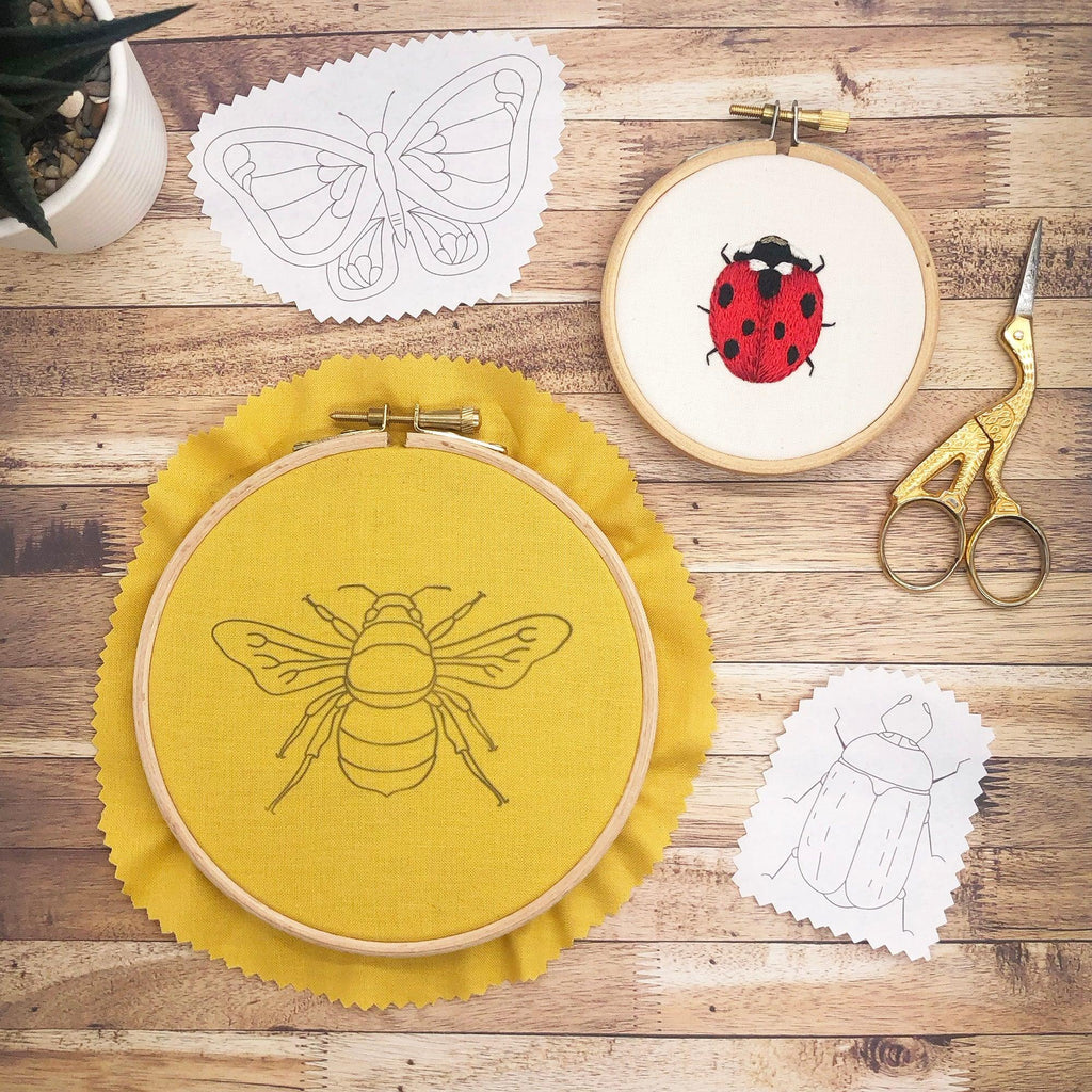 Table showing insect embroidery hoops and insect embroidery patterns hand embroidered ladybird and  honey beeBugs and Butterflies: Iron-On Embroidery Transfer Patterns - Lazy May Embroidery